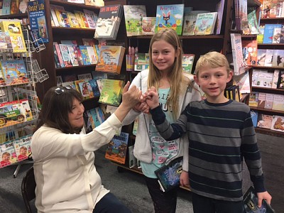 Amy with Ellie and Cooper Trummel Pinkie swear! Rainy Day Books